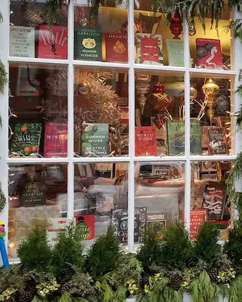 Holiday window display at a downtown bookshop
