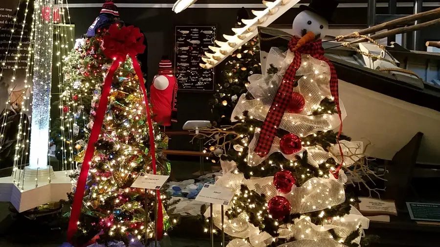 Snowman tree and ribbon tree beneath the whale skeleton
